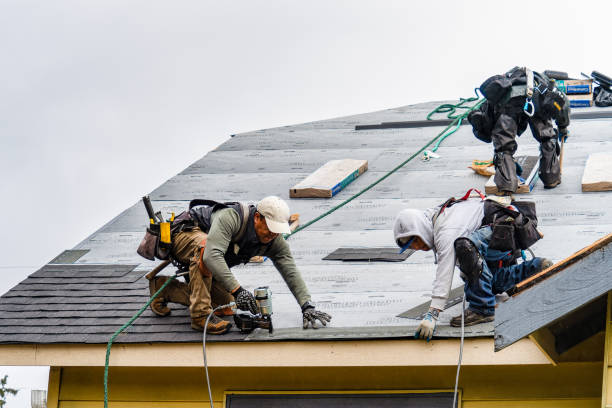Professional Roofing technician working in West Minot, ME